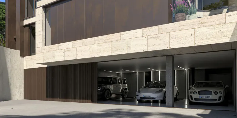Modern ultra-luxury villa exterior in Barcelona with open garage showing two luxury cars parked inside.