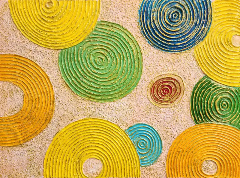 Abstract artwork of textured concentric circles in yellow, green, blue, orange, and red on beige background