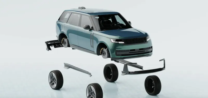 Exploded view of Racing Green Range Rover SUV model, showcasing separated chassis, wheels, and frame on white background.