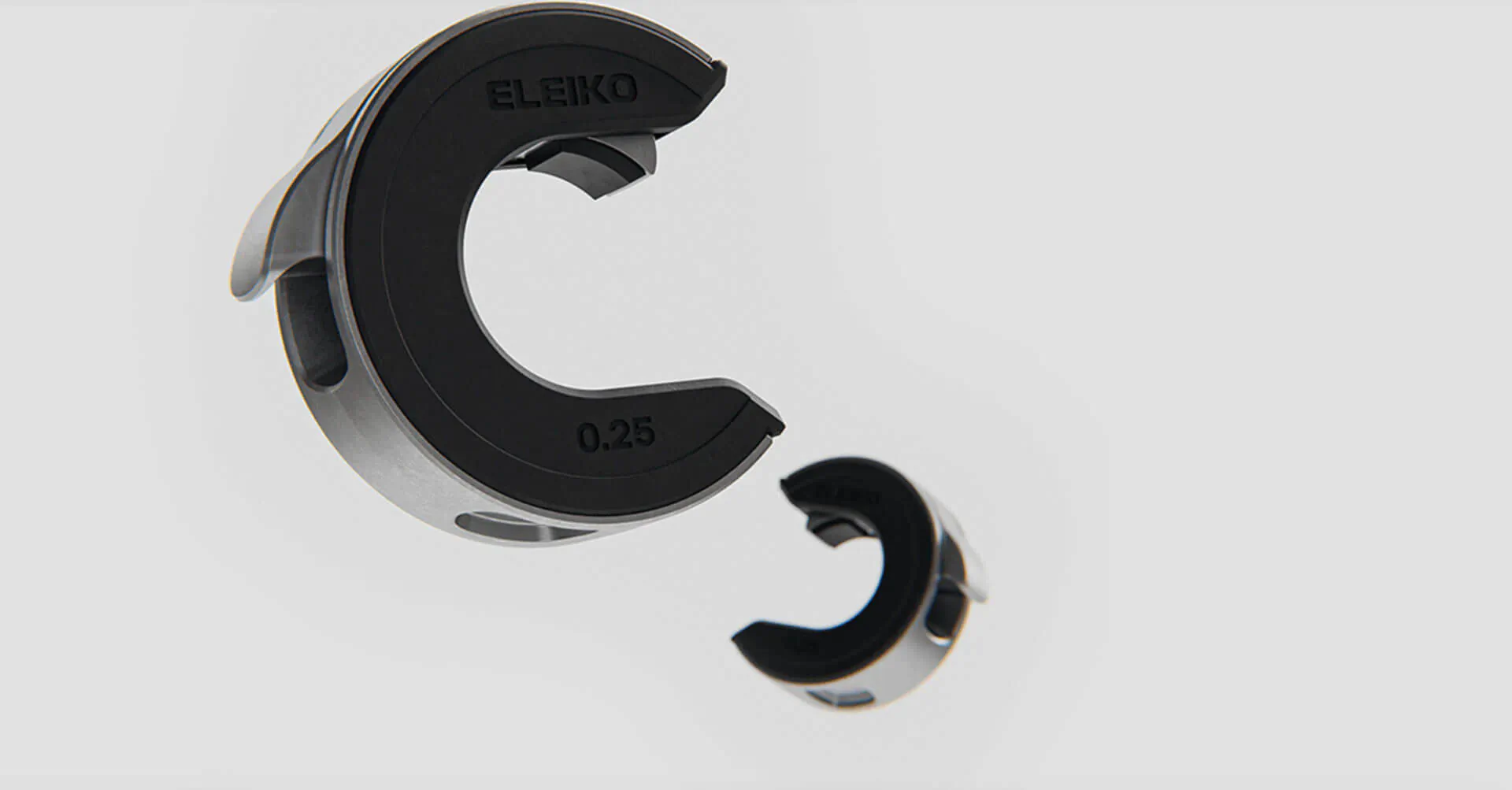 Eleiko Öppen Collars in black and silver, model ÖP3, C-shaped design, Red Dot Award 2021 winner, floating view.