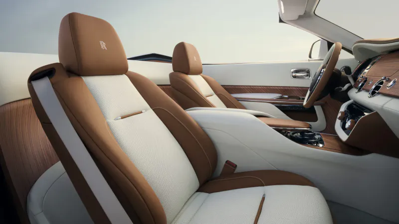 Rolls-Royce Arcadia Droptail interior: tan and white leather seats, wood trim, open-top luxury cabin