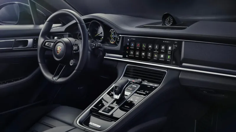 Porsche Panamera Platinum Edition interior: leather steering wheel, digital cluster, wide infotainment screen