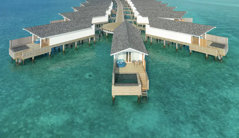 Aerial view of Amari Raaya Maldives overwater villas with private pool on turquoise lagoon