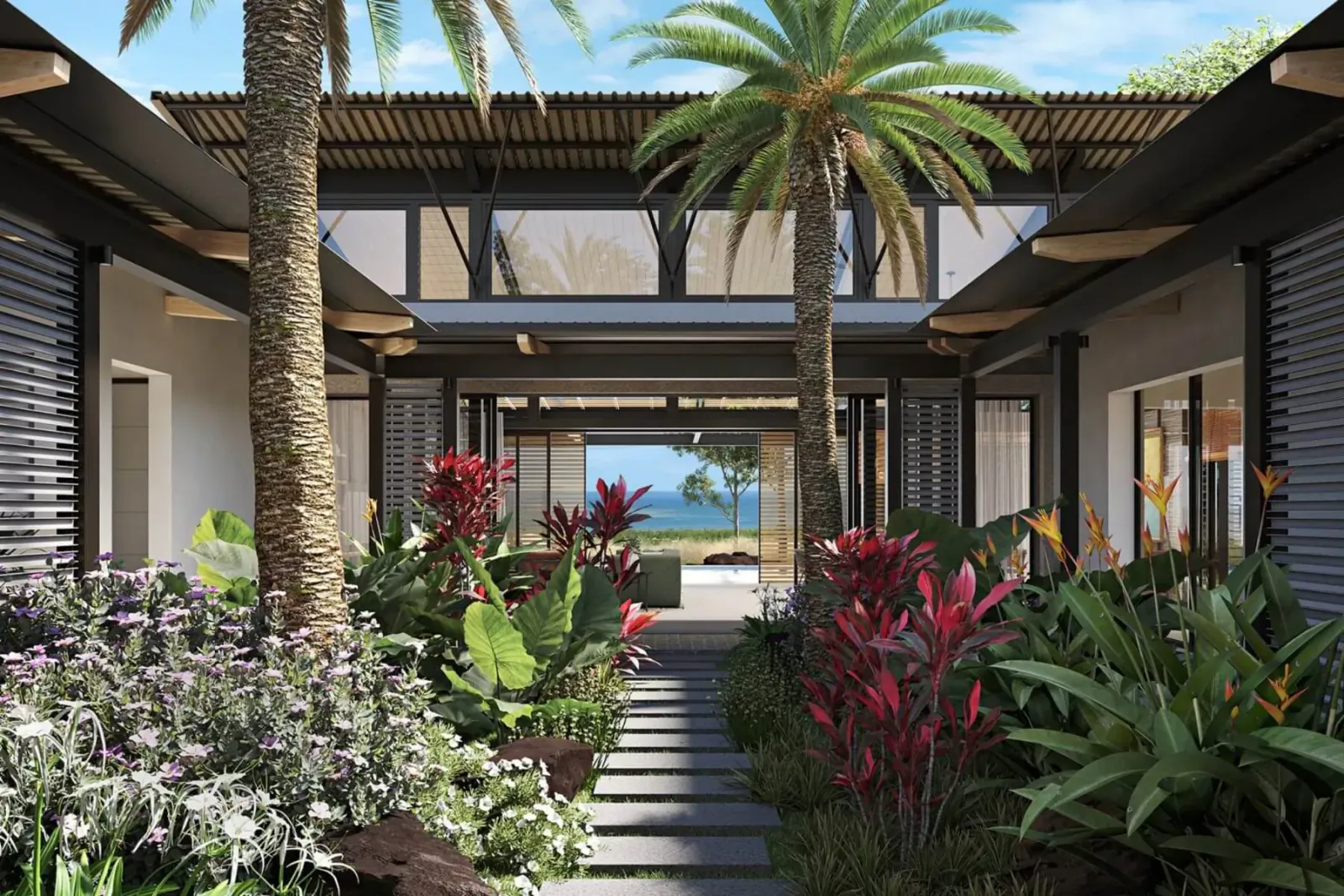 Modern tropical courtyard in Mauritian residence with palm trees, lush plants, stone path, and ocean view