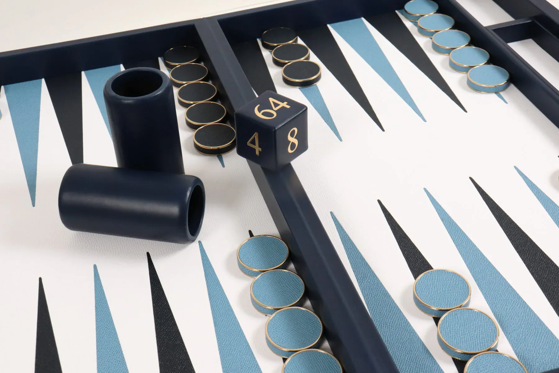 Luxury navy and teal backgammon board with black checkers, gold dice showing 64 and 48, and black cups.