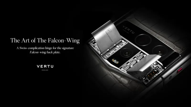 Vertu 'The Art of the Falcon Wing' luxury flip phone with signature design, angled view on black surface.