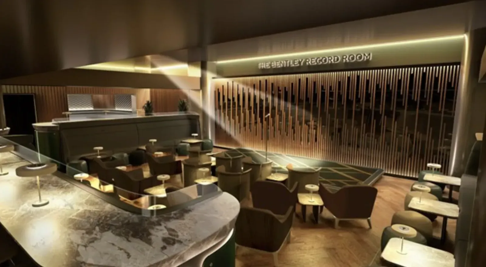 The Bentley Record Room at Co-op Live: curved bar, plush chairs, wood floors, warm lighting, and 'The Bentley Record Room' sign.