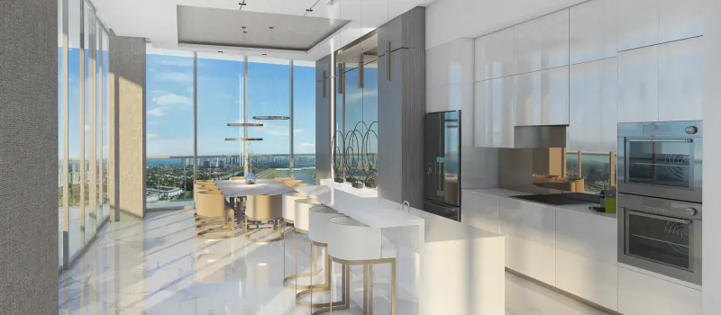 Modern luxury kitchen and dining area in Oasis Hallandale with panoramic ocean views, white cabinetry, and sleek furnishings.