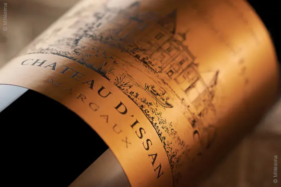 Close-up of Château d'Issan wine bottle label with gold castle illustration and 'Château d'Issan' text.