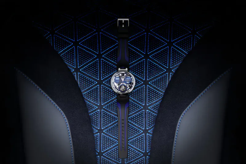 BOVET Battista Tourbillon luxury watch on blue strap against geometric blue pattern background