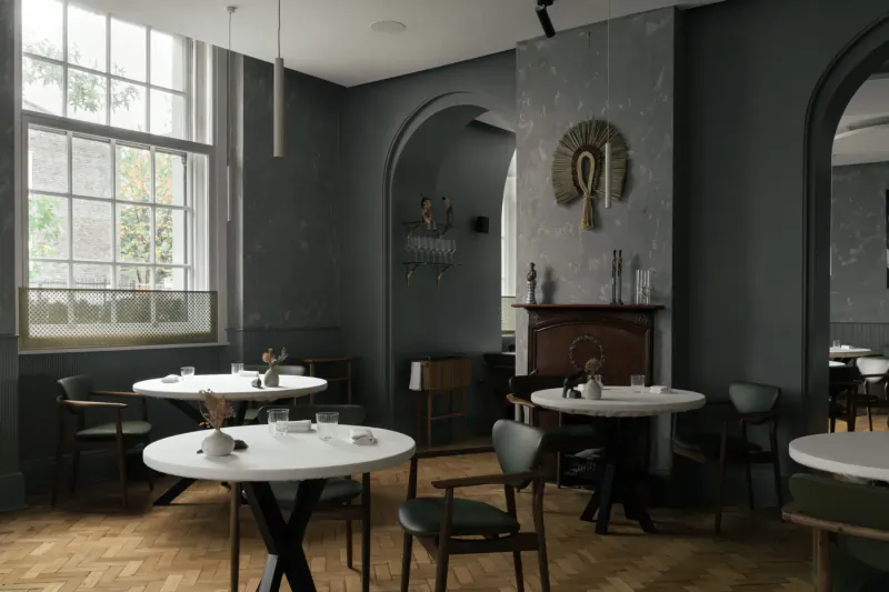 Elegant dining room at Da Terra with white round tables, green chairs, potted plants, large windows, and fireplace.