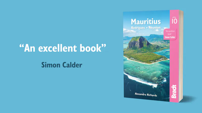Bradt Mauritius, Rodrigues & Réunion guidebook cover with aerial view of Le Morne mountain and turquoise sea