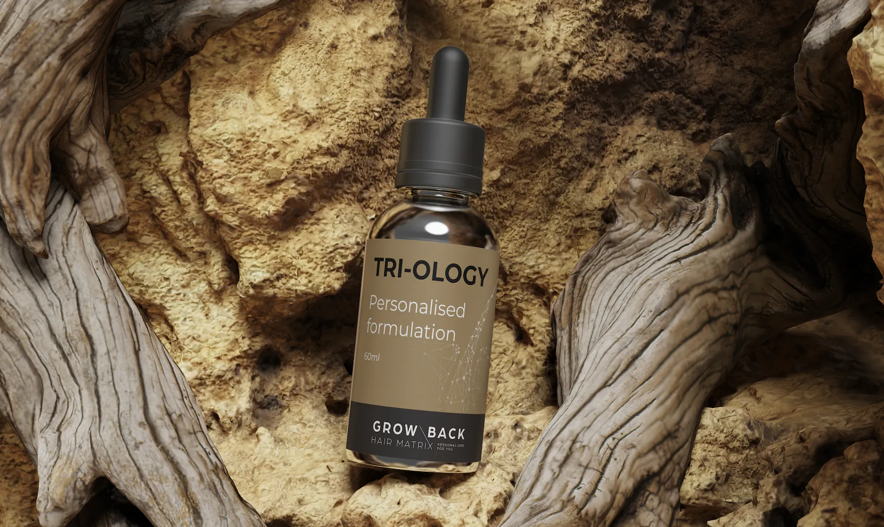 Tri-Ology personalised formulation 30ml dropper bottle labeled 'Grow Back' resting on textured rock with driftwood