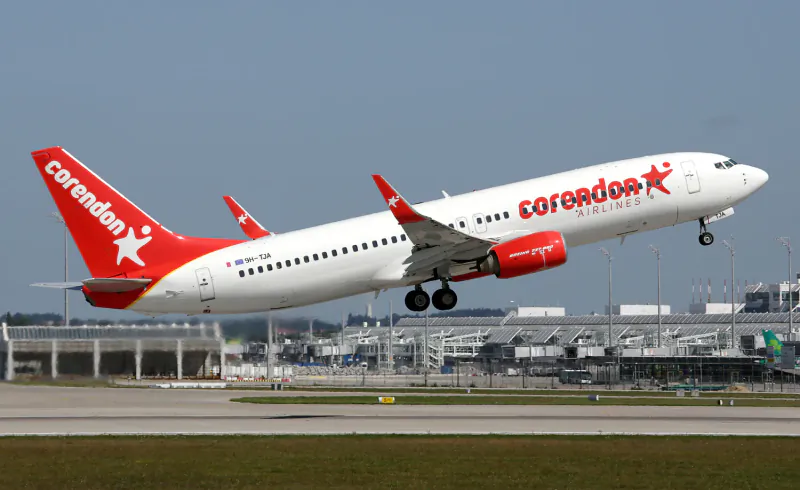 Corendon Airlines Boeing 737-800 with registration 9H-TJA taking off from an airport runway