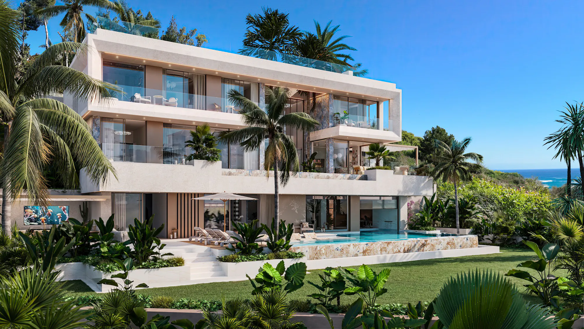 Modern multi-level luxury villa with pool, palm trees, and ocean view under clear blue sky